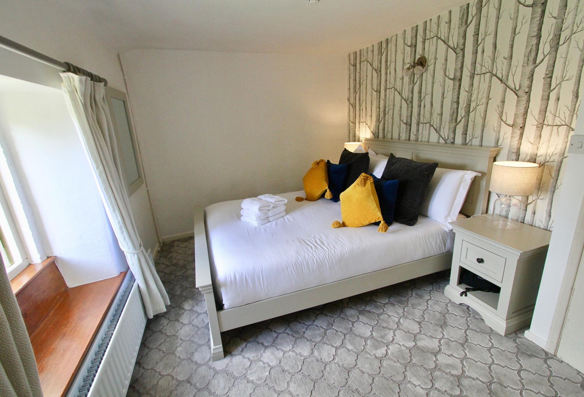 Hotel Ashfield House Grassington Exteriér fotografie A bedroom at The Old Inn